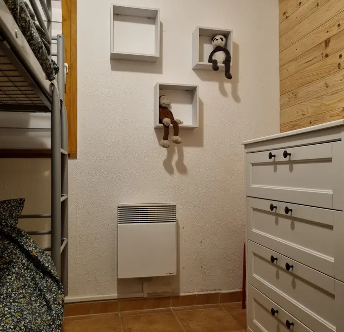 Bedroom 2 with bunk bed and chest of drawers